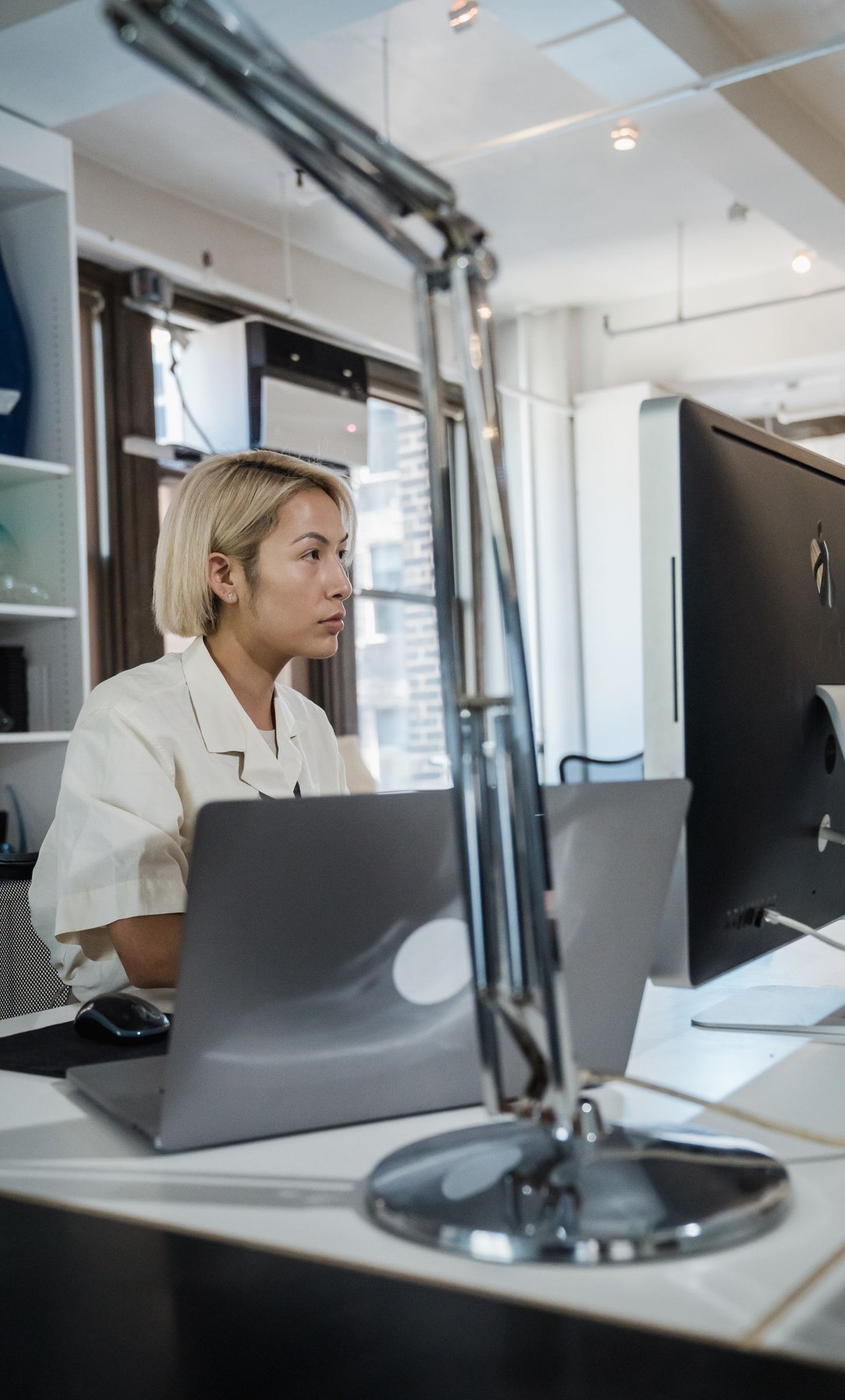 Developer working at a desktop computer