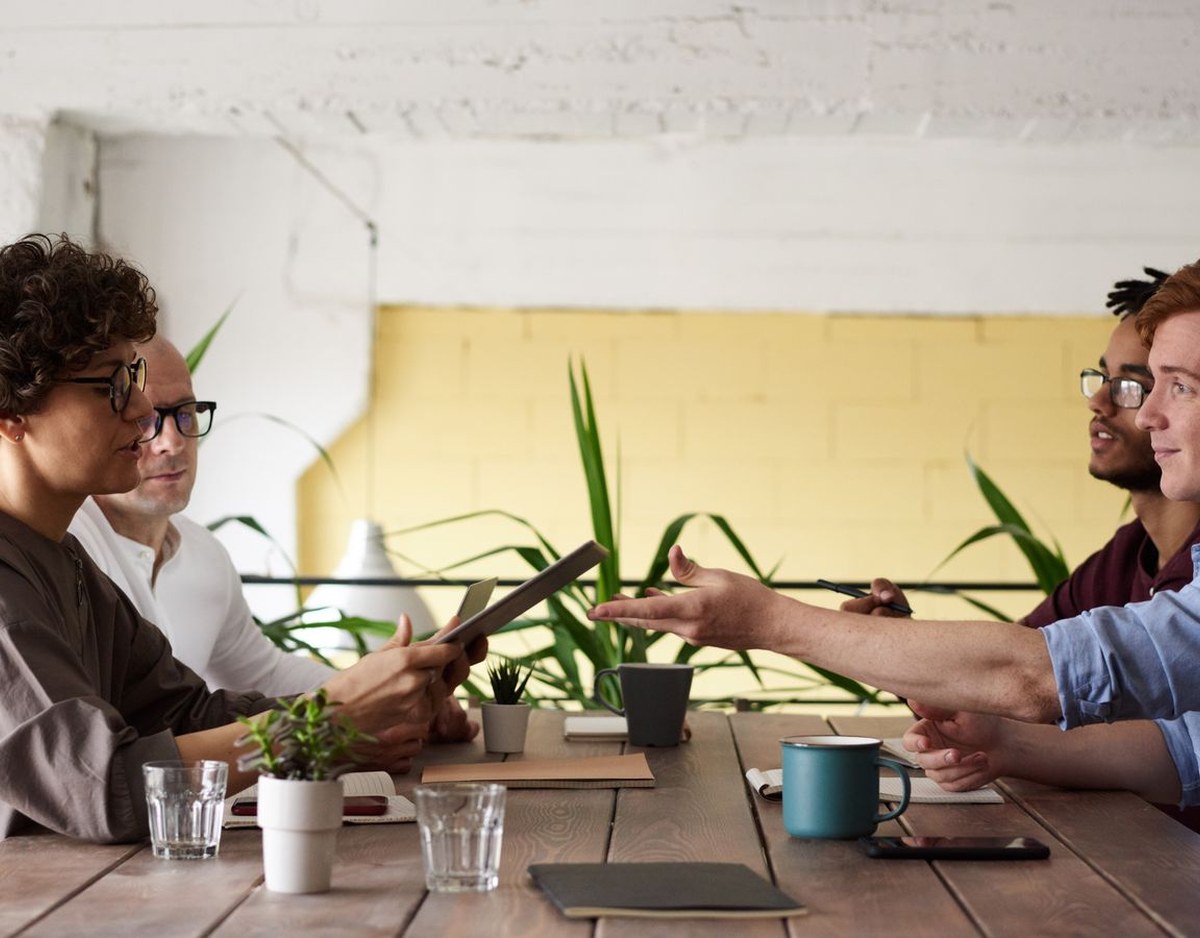 Colleagues collaborating in a shared workspace